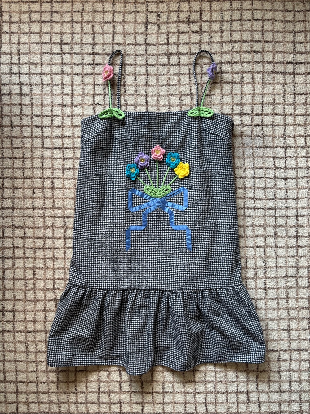 Teddy Fresh babydoll dress with ruffle hem.